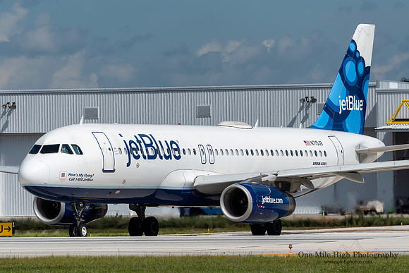 Airbus A320-232 (N715JB) - "How's My Flying? Call 1-800-JetBlue"
