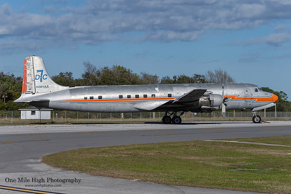 1956 Douglas DC-7BF (N381AA) - Turks Air Inc